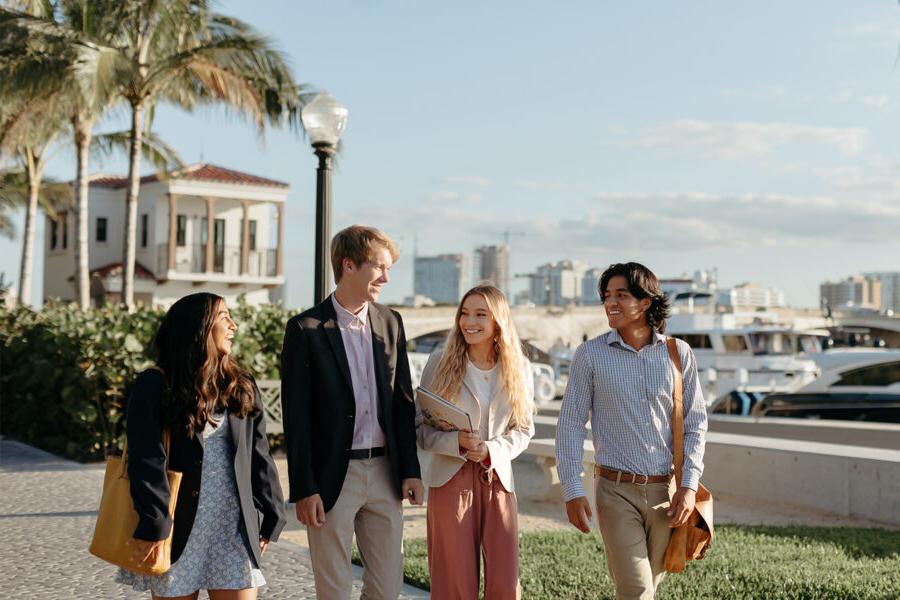 master of business administration mba students walk near the intercoastal waterway in 西<a href='http://f.portie-gardie.net'>推荐全球最大网赌正规平台欢迎您</a>.